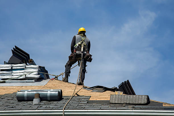 Professional Roofing technician working in Russell, KS